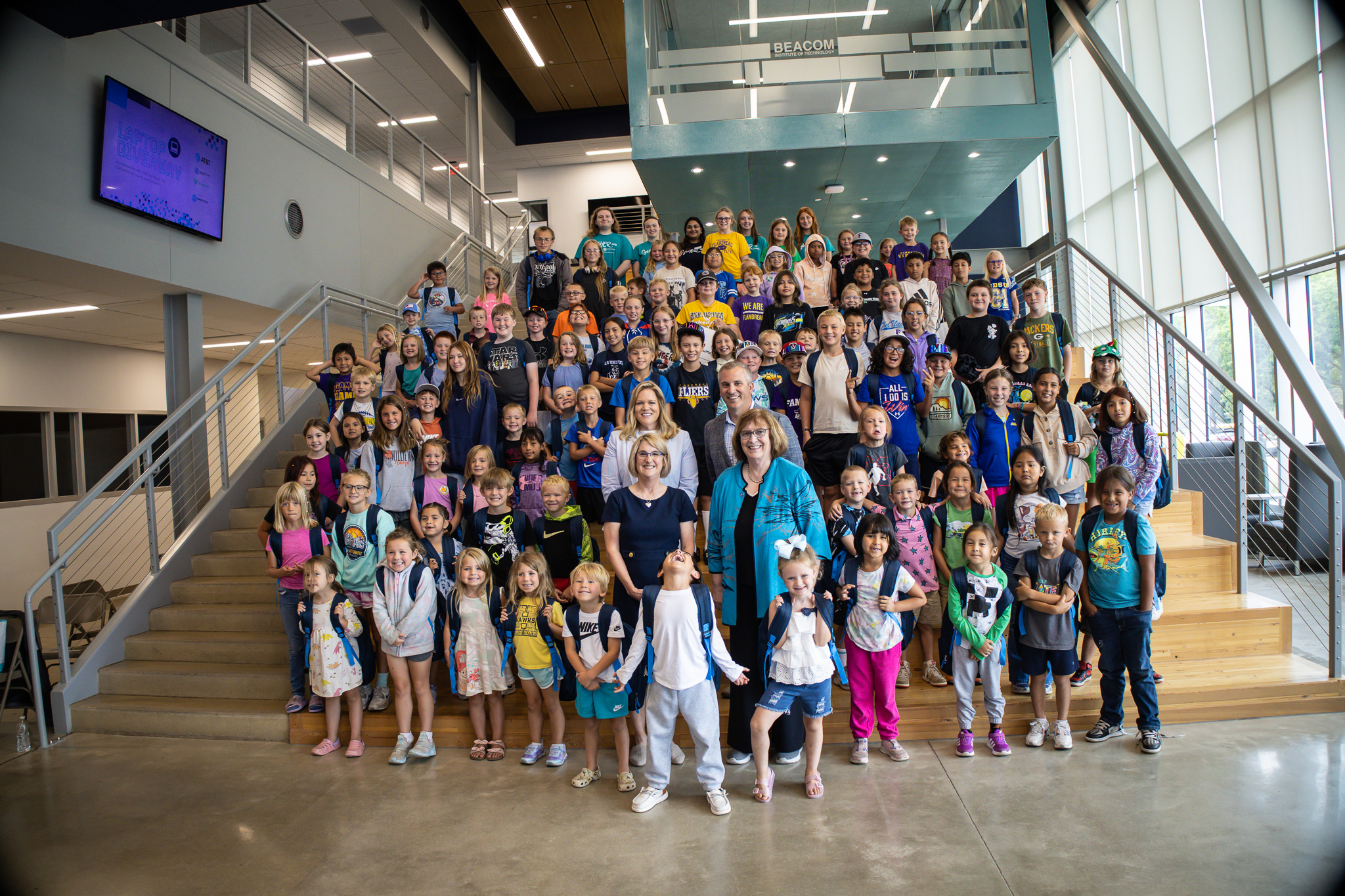 Moody County students celebrate their new backpacks and laptops.